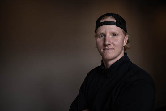 Rasmus Dahlin poses for a portrait at a press event with
