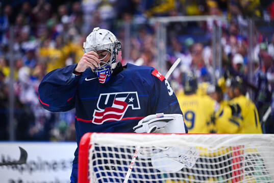 Alex Lyon of USA looks dejected