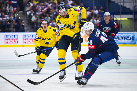 Erik Karlsson of Sweden and Luke Huges of USA