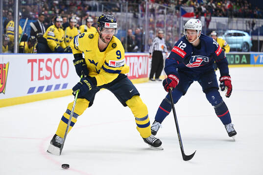 Adrian Kempe of Sweden and Matt Boldy of USA