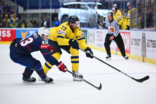 Luke Huges of USA and Victor Hedman of Sweden