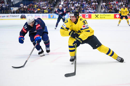 Luke Kusin of USA and Isac Lundeström of Sweden