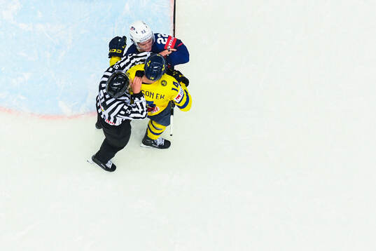 Cole Caufield of USA and Joel Eriksson Ek of Sweden