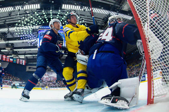 Zach Werenski of USA against Victor Olofsson of Sweden