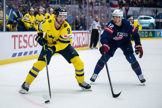 Adrian Kempe of Sweden and Matt Boldy of USA