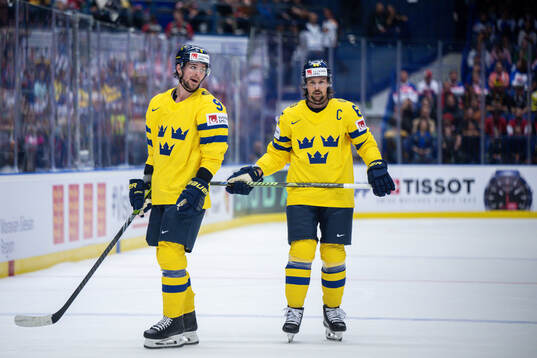 Adrian Kempe and Erik Karlsson of Sweden