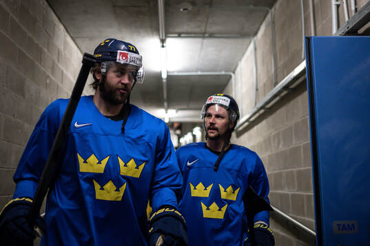 Victor Hedman and Erik Karlsson of Sweden at a practice