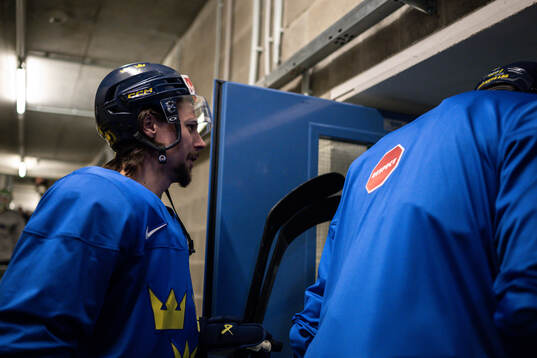 Victor Hedman and Erik Karlsson of Sweden at a practice
