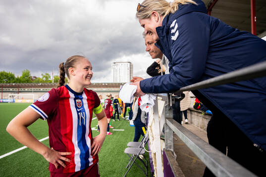 Tuva Olaussen Sagen of Norway with family in the stands