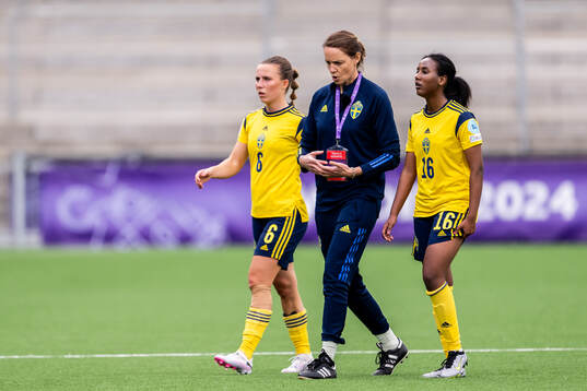 Nathalie Staaf, Head coach Lovisa Delby and Saron Berhe of