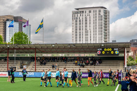 Referee Lotta Vuorio with assistant referees Katrine