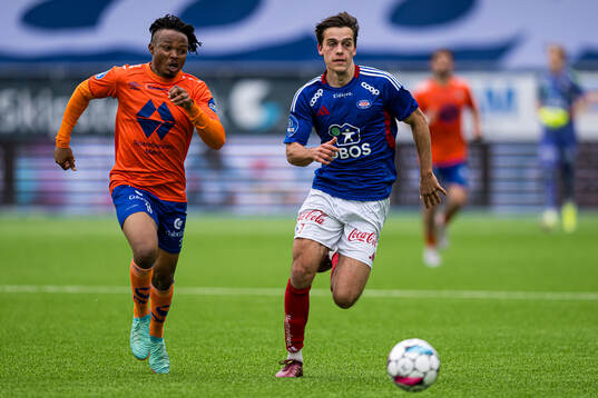 Isaac Atanga of Aalesund and Magnus Riisnæs of Vålerenga