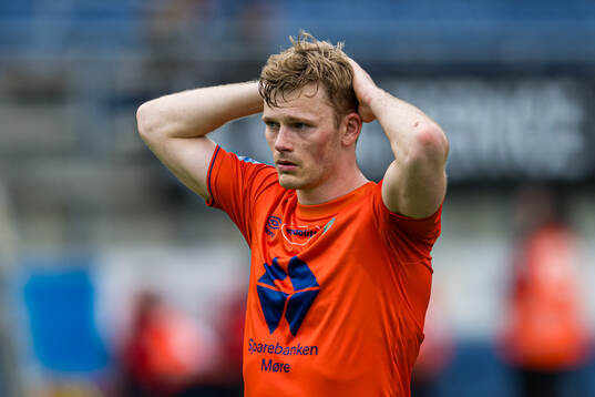 Håkon Hammer of Aalesund looks dejected
