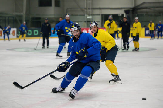 Erik Karlsson and Max Friberg of Sweden at a practice