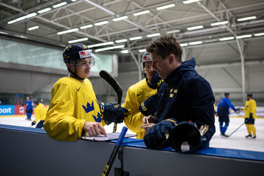 Jonas Brodin, Isac Lundeström and assistant coach Stefan