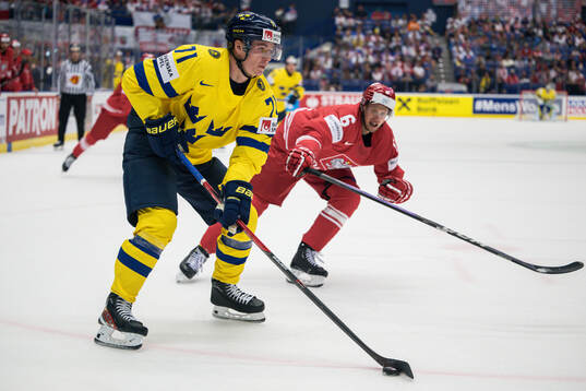 Victor Olofsson of Sweden and Arkadiusz Kostek of Poland