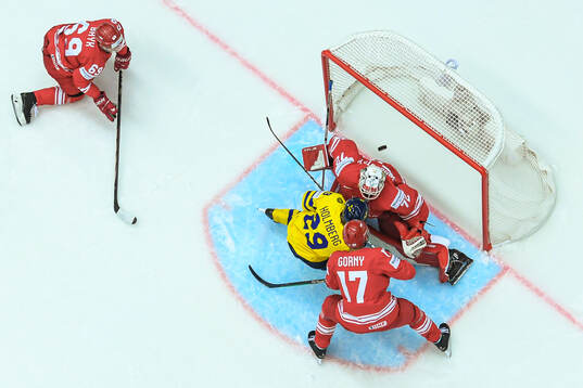 Pontus Holmberg of Sweden against goaltender David