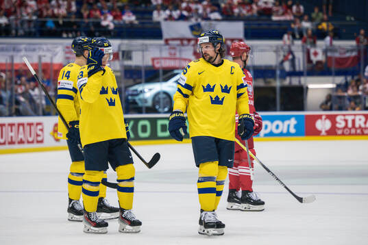 Lucas Raymond and Erik Karlsson of Sweden