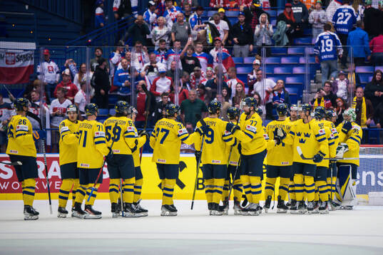 Players of Sweden celebrate
