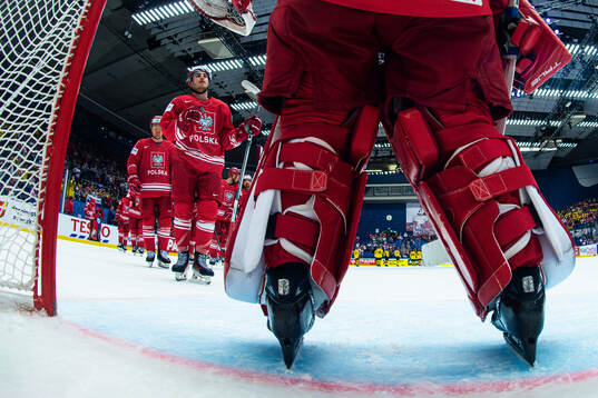 Players of Poland thank goaltender David Zabolotny