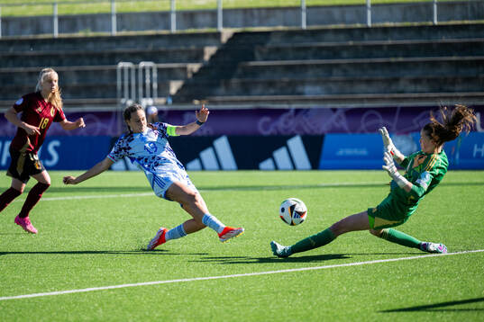Alba Cerrato of Spain scores 2-0 behind goalkeeper Aude