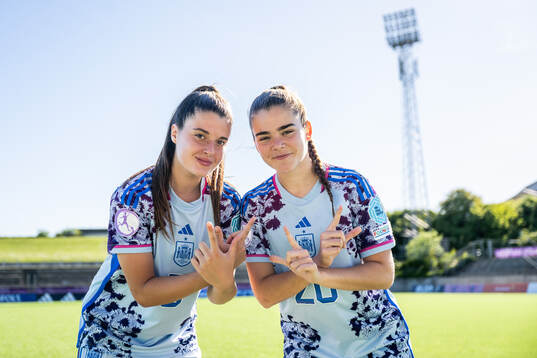 Nerea Carmona and Natalia Escot of Spain celebrate