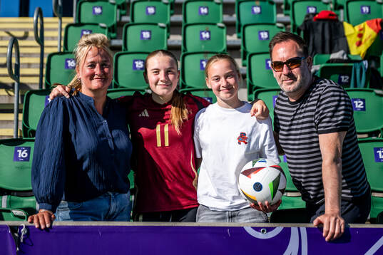 Finne Van Looveren of Belgium with family in the stands