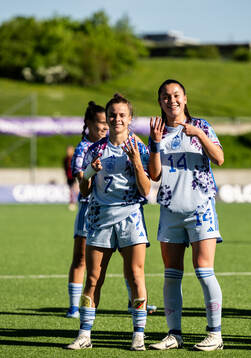 Noa Ortega and Lua Calo of Spain celebrate