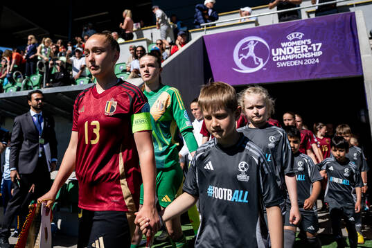 Axelle Bamps and goalkeeper Aude Waldbillig of Belgium