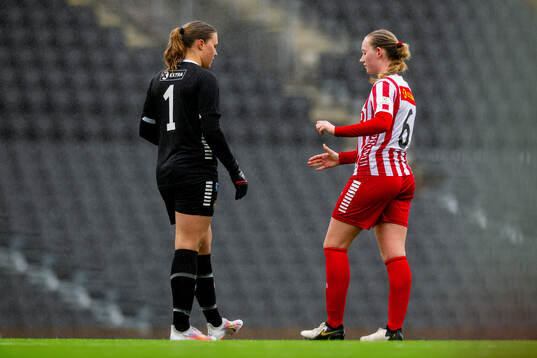 Goalkeeper Marie Aspenes and Emilie Sofie Ludvigsen of TIL