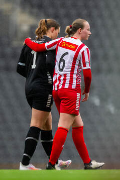 Goalkeeper Marie Aspenes and Emilie Sofie Ludvigsen of TIL