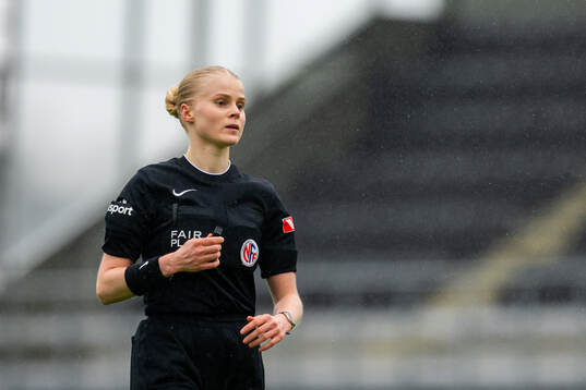 Referee Marie Green Dahle