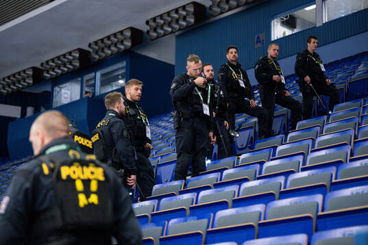 The police search the arena for suspicious objects