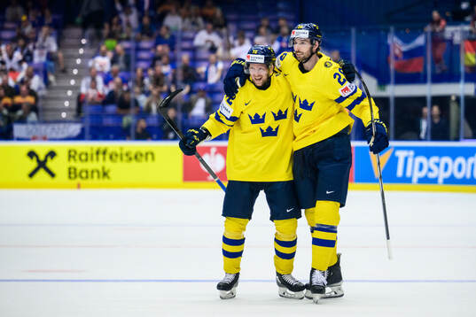 Tim Heed and Marcus Pettersson of Sweden celebrate