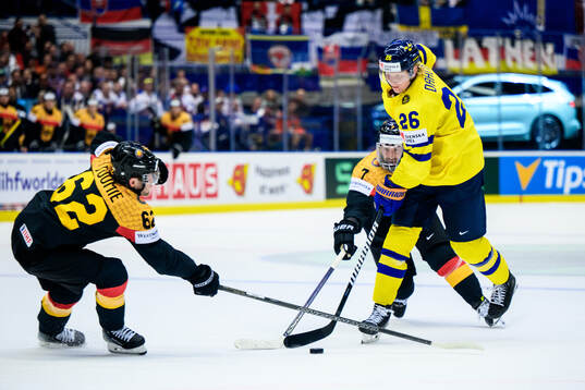 Parker Tuomie of Germany and Rasmus Dahlin of Sweden