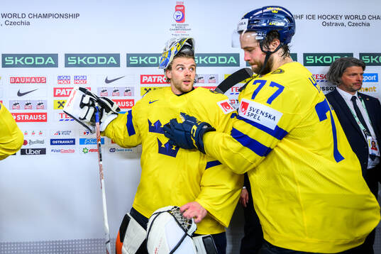 goaltender Samuel Ersson and Victor Hedman of Sweden