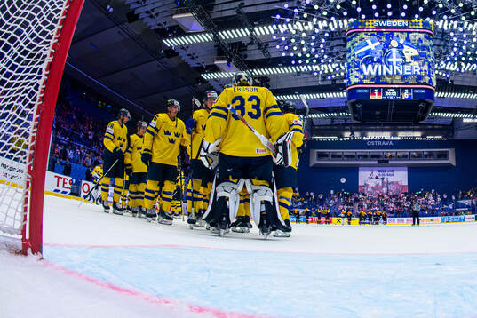 Goaltender Samuel Ersson of Sweden celebrate the win with