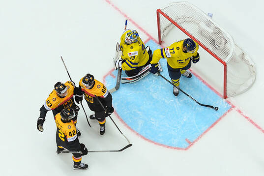 Leonhard Pfoderl of Germany celebrate the 1-5 goal behind