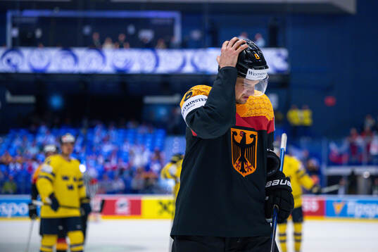 Kai Wissman of Germany looks dejected