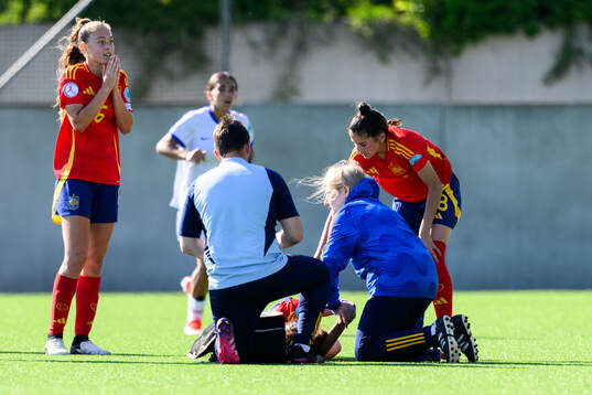 Lorena Cubo of Spain reacts to Silvia Fernandez in pain