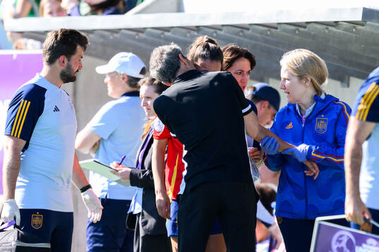 Head coach Cécile Locatell of France consoles Silvia