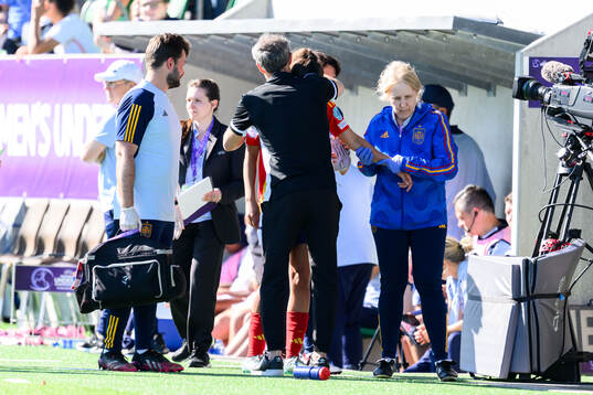 Head coach Cécile Locatell of France consoles Silvia
