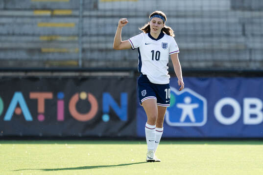 Vera Jones of England celebrates