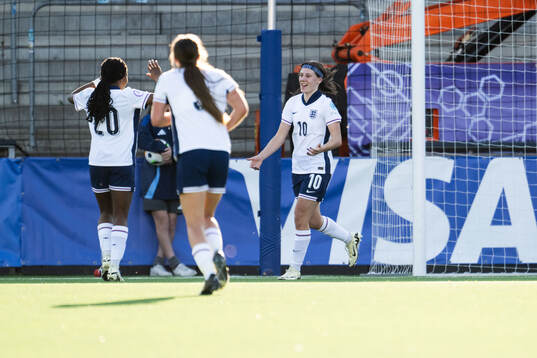 Vera Jones of England celebrates