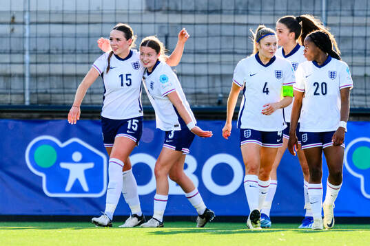 Niamh Peacock of England celebrates scoring 1-0