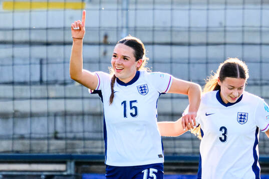 Niamh Peacock of England celebrates scoring 1-0