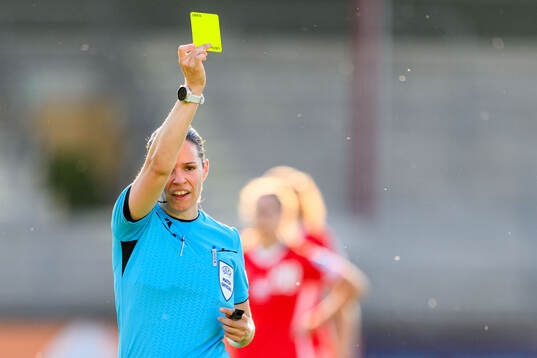 Referee Deborah Anex