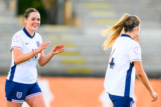 Niamh Peacock of England celebrates