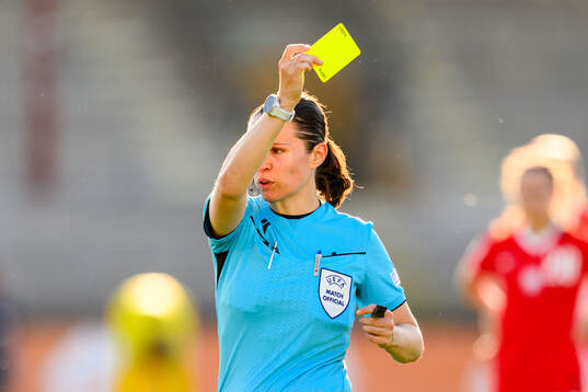 Referee Deborah Anex