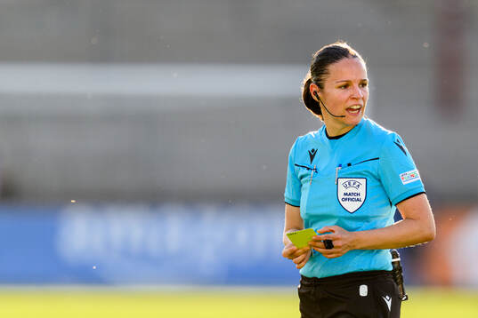 Referee Deborah Anex